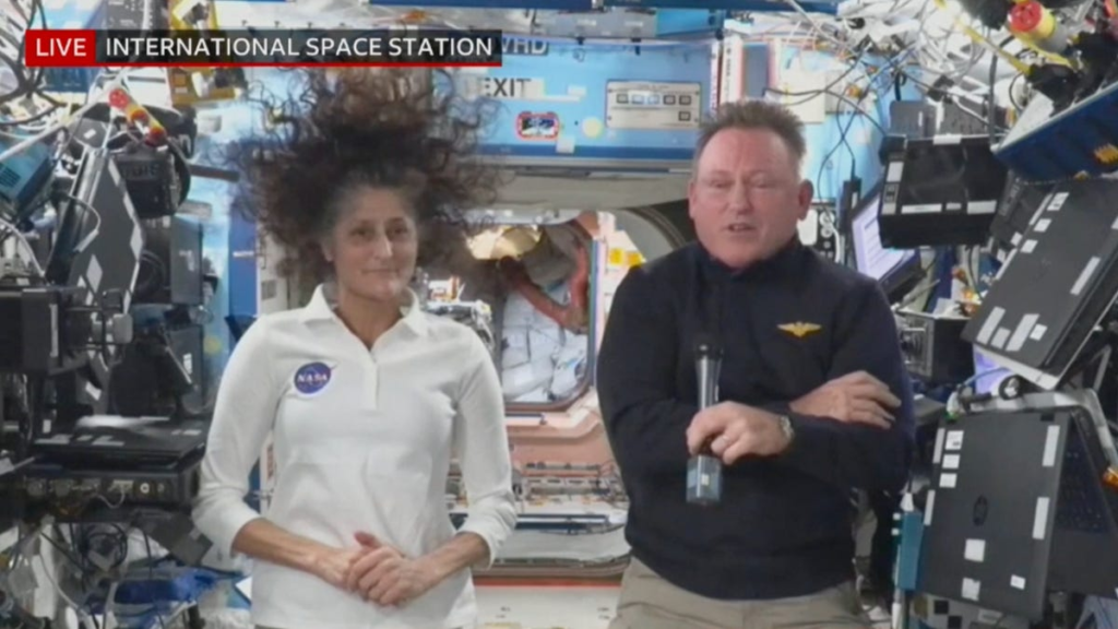 Barry "Butch" Wilmore and Sunita "Suni" Williams are shown responding to media questions in March 2024.